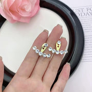 スタッドピアス レディース アクセサリー ピアス ドロップ 弓 アーチ型 耳飾り ラインストーン ビジュー かわいい おしゃれ
