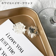 ピアス スタッドピアス イヤリング イヤークリップ レディース 女性 アクセサリー 耳飾り イヤーカフ ノンホールピアス フラワー 花 クリアカラー 透明 スケルトン かわいい キュート シンプル ガーリー 華やか お出かけ お呼ばれ プレゼント ギフト 白 紫 橙