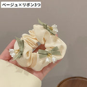 シュシュ ヘアアクセサリー レディース キッズ 女の子 スズラン フラワー 花モチーフ タッセル付き リボン かわいい 可愛い おしゃれ シンプル キラキラ クリーム ベージュ 緑