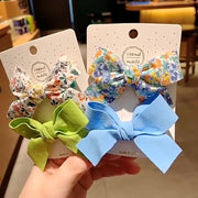 ヘアクリップ 2個セット 2種セット キッズ ジュニア 女の子 ヘアアクセサリー ファッション雑貨 リボン 大きめ 無地 総柄 花柄 ピンク ブルー オレンジ かわいい キュート カジュアル ポップ