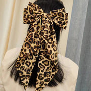 バレッタ 髪飾り 髪留め 女性 レディース ヘアアクセサリー ヘアクリップ リボン ヒョウ柄 レオパード柄 大ぶり ファッション小物 ヘアアレンジ まとめ髪 かわいい 存在感 ガーリー おしゃれ ギフト プレゼント 揺れる 白 赤 黄
