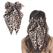 バレッタ 髪飾り 髪留め 女性 レディース ヘアアクセサリー ヘアクリップ リボン ヒョウ柄 レオパード柄 大ぶり ファッション小物 ヘアアレンジ まとめ髪 かわいい 存在感 ガーリー おしゃれ ギフト プレゼント 揺れる 白 赤 黄
