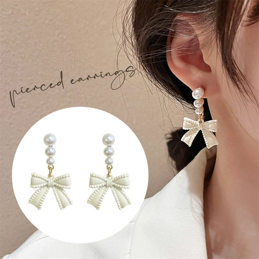 ピアス レディース アクセサリー スタッドピアス リボン 揺れる 商品画像