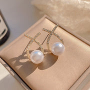 ピアス スタッドピアス レディース 女性 アクセサリー クロス フェイクパール ラインストーン おしゃれ 上品 大人可愛い 普段使い お出かけ ギフト プレゼント 婦人用