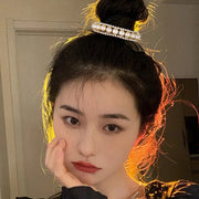 ヘアクリップ ヘアリング レディース 女性 ヘアアクセサリー ファッション雑貨 雫型 ドロップ型 コーム タッセル ラインストーン キラキラ ブラック かわいい キュート ガーリー 華やか おしゃれ