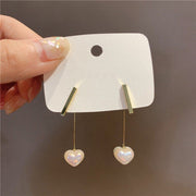 ピアス スタッドピアス 両耳用 バックキャッチ レディース 女性 アクセサリー 耳飾り ハート フェイクパール ロング スティック バー 揺れる シンプル きらきら 上品 ゆらゆら かわいい キュート 定番 おしゃれ プレゼント ギフト 記念日 お出かけ