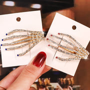 ヘアクリップ くちばしクリップ ヘヤーアクセサリー スカル 骸骨 がいこつ ガイコツ 手 ハンド 指 ゴスロリ ゴシック風 V系 ラインストーン キラキラ パーティー ハロウィン かっこいい