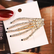 ヘアクリップ くちばしクリップ ヘヤーアクセサリー スカル 骸骨 がいこつ ガイコツ 手 ハンド 指 ゴスロリ ゴシック風 V系 ラインストーン キラキラ パーティー ハロウィン かっこいい
