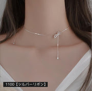 ネックレス ペンダント チャーム チェーンネックレス 首飾り レディース アクセサリー シンプル 上品 ラインストーン ゴールドカラー シルバーカラー リボン バー V字 フィッシュボーン