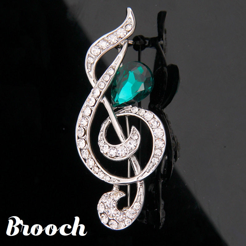ピンブローチ レディース アクセサリー ラインストーン ビジュー ト音記号 商品画像