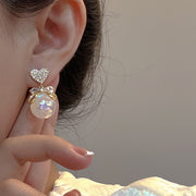 ピアス スタッドピアス レディース アクセサリー パール風 フェイクパール ゴールドカラー 大ぶり 揺れる おしゃれ きれいめ かわいい ギフト 贈り物