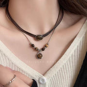 ネックレス 2本セット 重ね付け アクセサリー レディース 女性 レザー調 チェーン 丸モチーフ おしゃれ かわいい プレゼント ギフト ファッション小物
