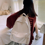 リュックサック デイパック レディース 女性 メンズ 男性 ユニセックス 男女兼用 鞄 カバン フロントポケット サイドポケット 大容量 大きめ 防水 チャック ジッパー 持ち手付き オックスフォード 無地 ホワイト ブラック ネイビー シンプル カジュアル かわいい キュート 通勤 通学