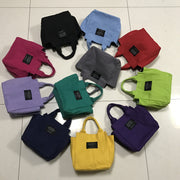 ミニトートバッグ ハンドバッグ ポケット 手提げ 鞄 カバン レディース 女性 婦人用 キャンバス 帆布 キャンバス おしゃれ かわいい お弁当バッグ 水筒 シンプル マチ付き 丈夫 マグネットボタン デイリー 通勤 通学 お出かけ 普段使い カジュアル