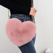 ショルダーバッグ レディース 女性 鞄 カバン コンパクト 小さめ ハート型 チャック ジッパー ファスナー フェイクファー 無地 ふわふわ フェミニン ガーリー かわいい 可愛い キュート ポップ カジュアル おしゃれ