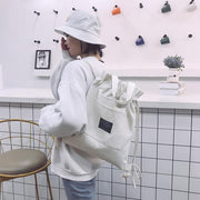 2wayバッグ ナップサック トートバッグ 巾着バッグ キャンバス地 レディース 女性 カバン リュックサック 手提げ ポケット ロゴ カジュアル お洒落 お出かけ 普段使い 鞄 カバン