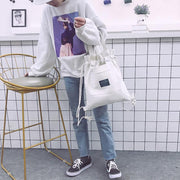 2wayバッグ ナップサック トートバッグ 巾着バッグ キャンバス地 レディース 女性 カバン リュックサック 手提げ ポケット ロゴ カジュアル お洒落 お出かけ 普段使い 鞄 カバン