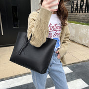 トートバッグ 手提げかばん レディース 女性 鞄 カバン 肩掛け ハンドバッグ マグネットボタン フェイクレザー タッセル付き 無地 単色 高級感 大容量 シンプル おしゃれ かわいい きれいめ お出かけ 通勤 通学 赤 青 黒 ピンク 茶