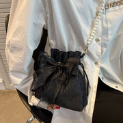 ショルダーバッグ ポシェット レディース 女性 女子 鞄 カバン バッグ 巾着 フェイクパール リボン 肩掛け 斜め掛け かわいい キュート 上品 フォーマル おしゃれ