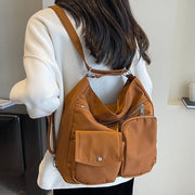 2wayバッグ ショルダーバッグ リュック レディース 女性 カバン 通勤 通学 シンプル フロントポケット 軽い 収納力 ブラック 黒 ホワイト ブラウン 大人 会社 シンプル カジュアル おしゃれ メンズ 男性 男女兼用 ユニセックス 鞄 四角形 スクエア マグネットボタン チャック ジッパー カニカン