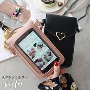 スマホショルダー ミニショルダーバッグ スマホポーチ ポシェット 女性 レディース 鞄 カバン 肩掛け 斜め掛け フェイクレザー ハート スマホ収納 お財布ポシェット スナップボタン 縦型 そのまま操作可能 単色 無地 シンプル かわいい ガーリー キュート おしゃれ お出かけ プレゼント 誕生日 ギフト 赤 灰 黒 ピンク 緑 青