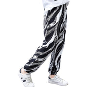 ジョガーパンツ ジョグパンツ 子供服 キッズ ジュニア ロングパンツ 長ズボン 裾絞り パンツ 総柄 プリント 裾リブ ウエストゴム サルエル 楽ちん 子供用 こども用 子ども用 男の子 女の子 男児 女児 カジュアル ボトムス