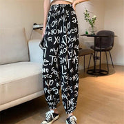 ロングパンツ ワイドパンツ レディース 女性 ボトムス 長ズボン 裾ゴム ウエストゴム 総柄 英字 カジュアル ゆったり 婦人服