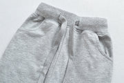 ロングパンツ 長ズボン スウェット 子供 キッズ 男の子 女の子 子供服 ボトムス ウエスト紐 ウエストゴム ポケット付き 無地 単色 裾絞り シンプル ゆったり 定番 かっこいい 運動 スポーツ 部屋着 パジャマ ルームウエア 灰