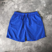 ショートパンツ ハーフパンツ 水陸両用 メンズ 男性用 ボトムス 海パン 短パン サーフパンツ 無地 大きいサイズ ポケット付き シンプル おしゃれ カジュアル ゆったり 普段着 デイリー 海水浴 プール カラバリ豊富 ホワイト ブラック グレー ブルー ネイビー レッド 黒 白 青 赤