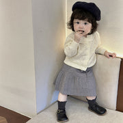 スカート ニット ベビー キッズ 子供服 女の子 赤ちゃん インナーパンツ 一体型 ミニ丈 ボトムス シンプル 単色 おしゃれ かわいい リボン紐 チラ見え防止 プリーツ風