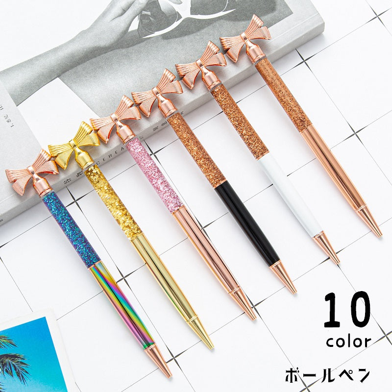 ボールペン 文房具 文具 筆記用具 ステーショナリー ペン リボン ビーズ入り キラキラ かわいい ゴージャス 華やか おしゃれ きれいめ オフィス 学校 事務用品 プレゼント ギフト ローズゴールド 金色 銀色 ピンク 白 黒 グラデーションカラー