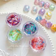 ネイルパーツ 50ピースセット ケース付き ホログラム フレーク 花 月 星 フラワー スター リボン 蝶々 カラフル かわいい おしゃれ ネイルアート用品 ハンドメイドパーツ デコパーツ