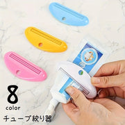 チューブ絞り器 押出器 日用品雑貨 チューブホルダー しぼり器 ホルダー 歯磨き粉 軟膏 絵の具 ハンドクリーム 化粧品 洗顔料 スクイーザー 単色 無地 キッチン 洗面台 シンプル 便利グッズ 黄 白 緑 ピンク