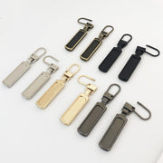 ジッパータブ 単品 1個 ジッパーヘッド プルタブ ファスナー 引き手 部品 パーツ ジッパー 交換用 替え 金具 チャック 交換部品 修理 手芸パーツ 和洋裁材料 ハンドメイド スライダー ジャンパー パーカー カバン ポーチ 小物 財布 シンプル かっこいい スタイリッシュ 黒 銀色 金色 ブロンズ