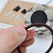 ヘアゴム用留め具 パーツ 100個セット ハンドメイド用品 台座 ゴム 手作り 貼り付け レジン デコ 服資材 ボタン足 固定 髪留め 手芸用品 透明 クリア ブラック