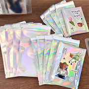 包装袋 粘着テープ付き 10枚セット 梱包袋 小分け ラッピング ビニール袋 プレゼント ギフト 包装 梱包 カード入れ キラキラ 銀色 虹色 オーロラ
