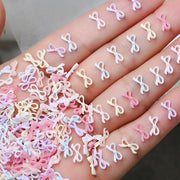 ネイルパーツ 同色50個セット ミニリボン 蝶結び 立体 ネイルアート 3Dアート ネイルチップ デコレーション セルフネイル