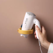 ドライヤーホルダー ドライヤーラック 壁掛け 壁面収納 貼り付け ドライヤー収納 ドライヤースタンド コンセント掛け 穴あけ不要 引っ掛け収納 ヘアドライヤー収納 日用品雑貨 洗面所 脱衣所 省スペース 便利グッズ シンプル 取り付け簡単 白 黄 黒