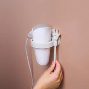 ドライヤーホルダー ドライヤーラック 壁掛け 壁面収納 貼り付け ドライヤー収納 ドライヤースタンド コンセント掛け 穴あけ不要 引っ掛け収納 ヘアドライヤー収納 日用品雑貨 洗面所 脱衣所 省スペース 便利グッズ シンプル 取り付け簡単 白 黄 黒