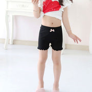 ペチパンツ キッズ ジュニア 子供用 子ども用 女の子 レディース 女性 下着 インナーパンツ インナーズボン アンダーウェア ショート丈 ミニ丈 ゴムウエスト フロントリボン 裾フリル 透け防止 パンチラ防止 無地 ホワイト ピンク ブラック シンプル 可愛い キュート ガーリー