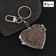 コンパクトミラー 手鏡 ハンドミラー バックチャーム キーホルダー型 折りたたみ カラビナ付き 見開き アクセサリー ハート型 ラインストーン 吊り下げ 便利 持ち運び シンプル かわいい おしゃれ ファッション雑貨