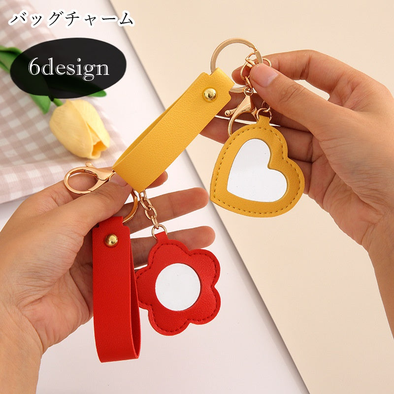 バッグチャーム キーホルダー キーリング レディース 女性 ファッション雑貨 ミラー付き 鏡付き カニカン 二重リング フェイクレザー フラワー 花 ハート ラウンド レッド ピンク イエロー カジュアル ポップ 可愛い キュート おしゃれ