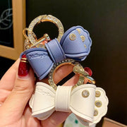 キーホルダー キーリング バッグチャーム レザー調 キーチャーム キーチェーン リボン ラインストーン エレガント おしゃれ かわいい ギフト 記念品 お土産 レディース メンズ 大人女子 カバン 鍵 カギ 目印