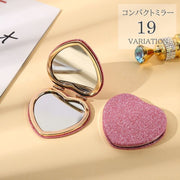コンパクトミラー 手鏡 レディース ハート 蝶々 丸型 ラウンド ラメ キラキラ グリッター かわいい おしゃれ ゴージャス ポケットミラー 女性 大人女子 化粧直し 持ち運び ポータブル 折り畳み メイク直し