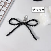 スマホチャーム 単品 1個 スマートフォンストラップ スマホストラップ リボンチャーム バッグチャーム 大きめ フェイクパール パール調 リボン バックチャーム 蝶結び キュート おしゃれ かわいい ブラック グレー ホワイト