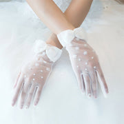 ウェディンググローブ 手袋 結婚式 ブライダル 新婦 花嫁 透け感 シースルー メッシュ パール調 フェイクパール リボン お花 フラワー ショート 上品 華やか 清楚 綺麗 可愛い 挙式 披露宴 二次会 パーティー 衣装 ウェディング小物 レディース 女性 ホワイト 白