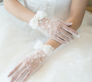 ウェディンググローブ 手袋 結婚式 ブライダル 新婦 花嫁 透け感 シースルー メッシュ パール調 フェイクパール リボン お花 フラワー ショート 上品 華やか 清楚 綺麗 可愛い 挙式 披露宴 二次会 パーティー 衣装 ウェディング小物 レディース 女性 ホワイト 白
