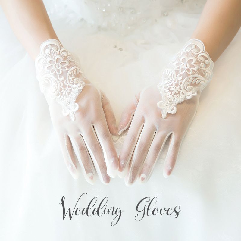 ウェディンググローブ 手袋 ショート レース 透け感 シースルー 結婚式 ブライダル 新婦 花嫁 上品 華やか 清楚 綺麗 挙式 披露宴 二次会 パーティー 衣装 ウェディング小物