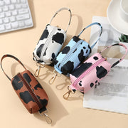 マナーポーチ うんち袋収納ポーチ お散歩ポーチ ペット用品 犬 いぬ お散歩グッズ ナスカン付き ハンドストラップ ファスナー 袋穴 牛柄 かわいい