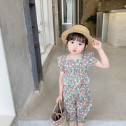 セットアップ 上下セット 2点セット ブラウス ハーフパンツ キッズ 女の子 トップス ボトムス 半袖 スクエアネック パフスリーブ ゴムウエスト 6分丈 裾ゴム ペプラム 総柄 花柄 ピンク レッド カラフル かわいい キュート 華やか リゾート着 夏